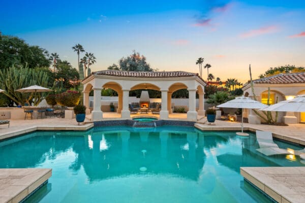 a luxury pool at sunset